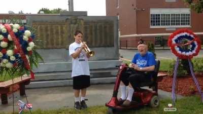 11 year old plays music for a veteran after Veterans Day parade was cancelled