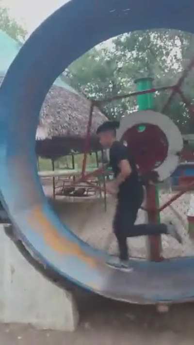 Playing on a giant hamster wheel