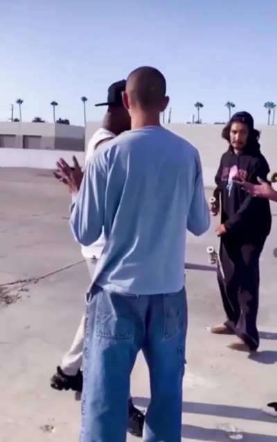 Trying to fight a group of skaters